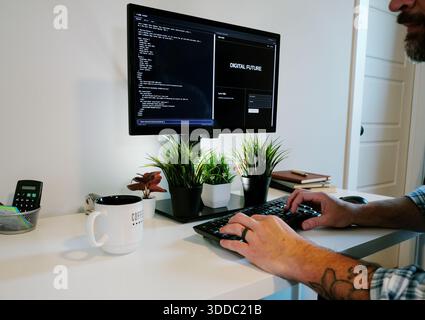 Middle Aged Software Engineer Vibe Codes Landing Page for Artificial Intelligence Based Integrated Development Environment Application Concept Stock Photo
