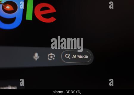 Closeup of computer screen with Google logo and AI mode button, dark tech background. High quality photo Stock Photo