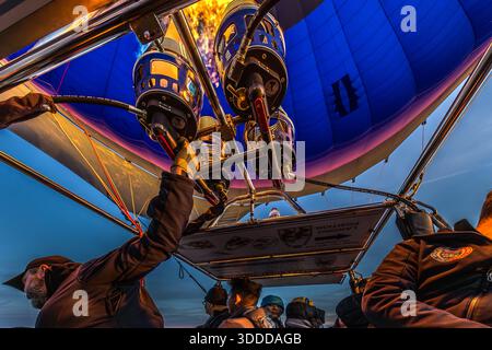 Passengers enjoy a balloon ride at sunrise in Göreme, Central Anatolia Region, Turkey Stock Photo