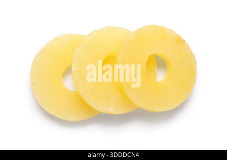 Canned pineapple rings on white background Stock Photo