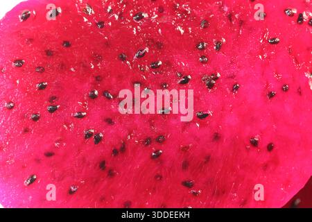 Close up of halfed dragon fruit isolated on white background. close up of dragon fruit slice surface. Stock Photo