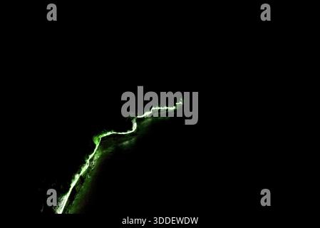 Green light in the dark Stock Photo