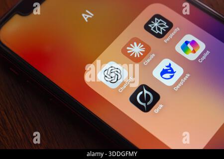 Quito, ECUADOR - Oct 6 2025 :ChatGPT and other popular AI assistant apps in one folder, illustrating artificial intelligence tools and AI chatbots. Stock Photo