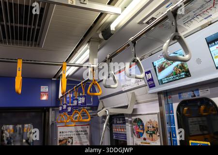 Handholds on a metro train in Japan - Yokohama, Japan - 7 November 2025 Stock Photo
