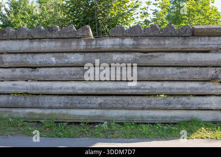 Stacked concrete slabs background with rough surface industrial texture and horizontal pattern Stock Photo
