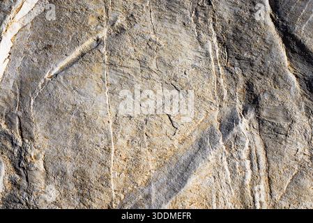 Real natural grunge rusted raw white marble stone surface texture as extracted from the mountain Stock Photo