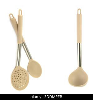 A set of beige silicone and stainless steel kitchen utensils is isolated on a white background. Stock Photo