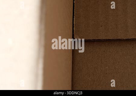 A close-up view reveals the unique textures and layers inside a cardboard box. Stock Photo