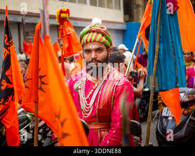 Mumbai, India - March 30, 2025: Unidentified man dressed in traditional attire with get up of Chattrapati Shivaji Maharaj  during a procession celebra Stock Photo
