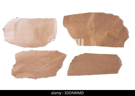 Set of torn brown kraft paper scraps isolated on white, rough textures for collage and handmade designs. Stock Photo