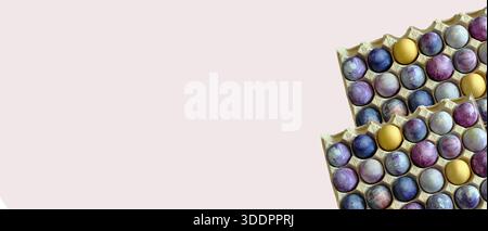 Colorful eggs patterns, 30 eggs, Easter eggs in a paper tray.. Large package of bright Easter eggs, isolated on light grey background. Spring banners Stock Photo