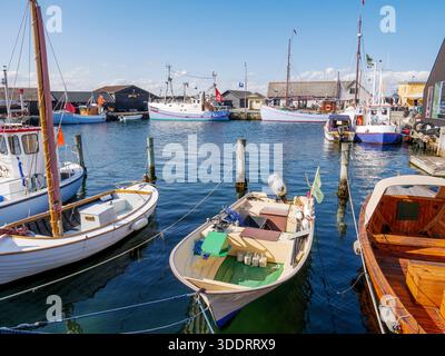 Fishing boats moored in small fishing harbour of Ebeltoft, Jutland, Denmark Stock Photo