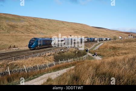 A diverted Avanti West Coast Mainline train (due to major works on the WCML), seen at Blea Moor, near Ingleton, on the Settle-Carlisle railway line. Stock Photo