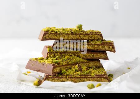Dubai chocolate, milk chocolate filled with pistachio paste and kunefe Stock Photo