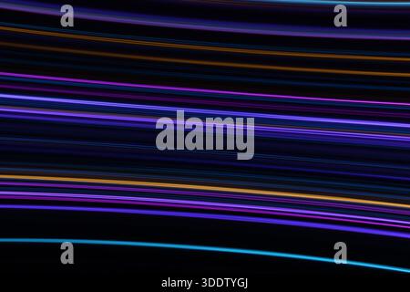 A long exposure photograph. Light painting photography, vibrant fairy lights in a parallel straight line pattern against a black background Stock Photo