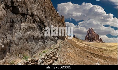 Shiprock, an ancient volcanic neck rising nearly 1,600 feet above the desert floor of northwestern New Mexico, is the eroded core of a large volcanic Stock Photo