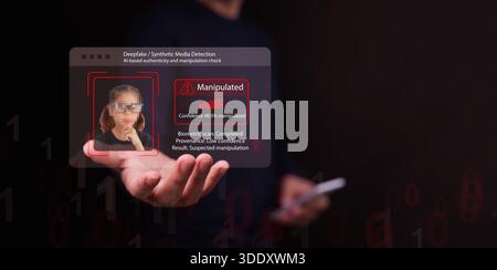 A man with smartphone uses AI-powered deepfake detection identifies manipulated media with high accuracy. Threats to digital identity, cybersecurity, Stock Photo