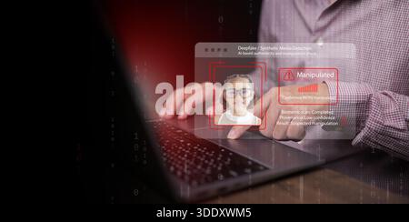 Man with laptop uses AI-based deepfake detection system to analyze manipulated facial data with high confidence. Digital security risks, importance of Stock Photo
