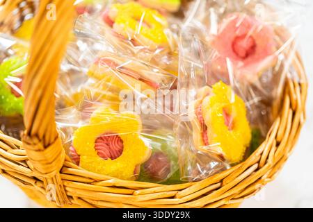 Wrapped Easter Cookie Sandwiches in Basket Stock Photo