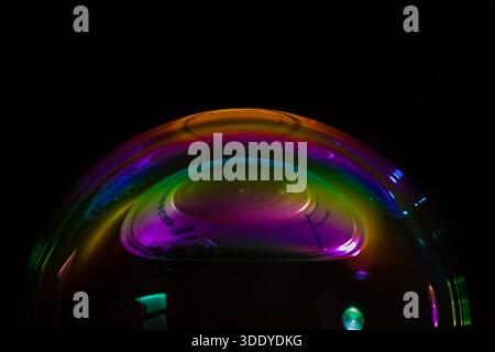 Soap bubbles isolated on a black background. Copy space. Stock Photo