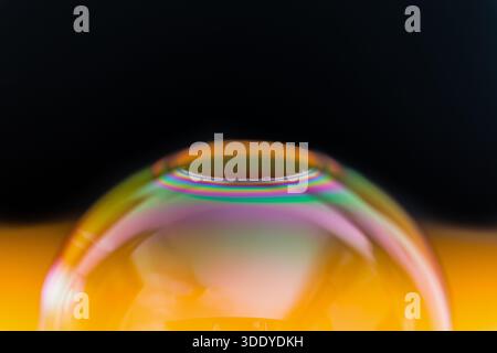 Soap bubbles isolated on a black background. Copy space. Stock Photo