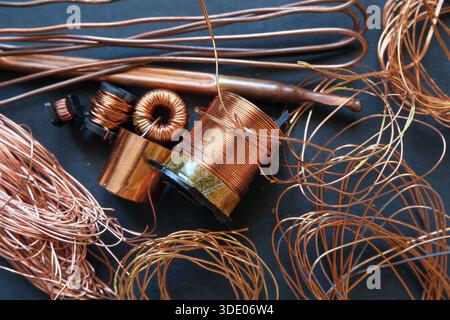 Various copper materials used for industrial purposes. Focused on spool. Stock Photo
