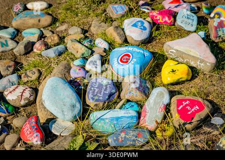 Seaside, OR, USA - November 13, 2025: Uniquely colorful, smooth, and multi-hued rocks and pebbles covering the shore of Painted Rock Beach on the Sout Stock Photo