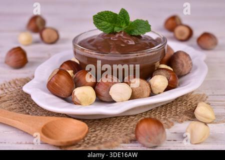 Chocolate spread with hazelnuts. Chocolate cream. Stock Photo