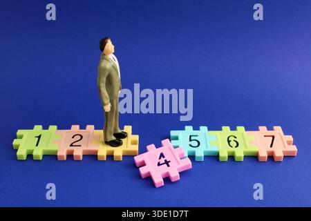 Overcoming the different stages of a numbered path Stock Photo - Alamy