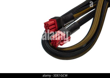 PCI-E power extension cables with red connectors and black-gold braided sleeves on white. Stock Photo