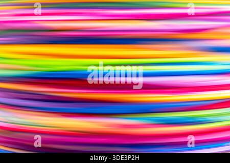 a abstract art piece featuring a dynamic, colorful composition of horizontal, overlapping lines in vivid shades Stock Photo