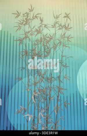 a piece of art or a decorative item featuring a bamboo motif against a blue and green background Stock Photo