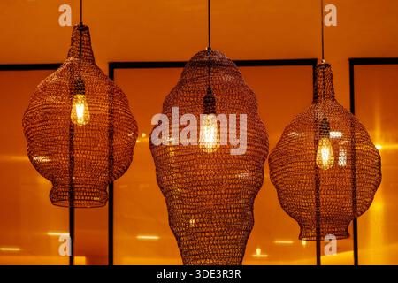 a set of style iron mesh pendant lights Stock Photo