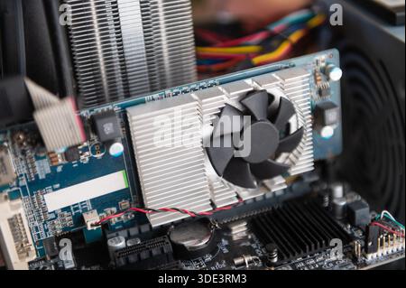 Close up of computer graphics card with cooling fan components Stock Photo