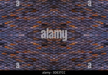 a textured, woven tile wall. The tiles are rectangular and arranged in a tight, interlocking pattern. The tiles have a slightly rough, matte finish wi Stock Photo