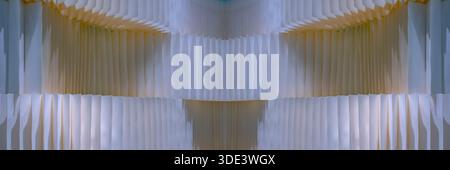 abstract, modern architectural structure composed of numerous vertical, pleated white panels. The lighting is soft, casting subtle shadows that accent Stock Photo