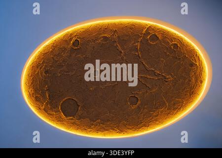 a textured, oval-shaped ceiling light with a glowing, warm yellow-orange edge. The textured surface resembles a rough, cratered moon, with various ind Stock Photo