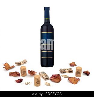 a  glass bottle centered on a white background. Surrounding the bottle are scattered items including crumpled brown paper bags, empty wine corks, smal Stock Photo