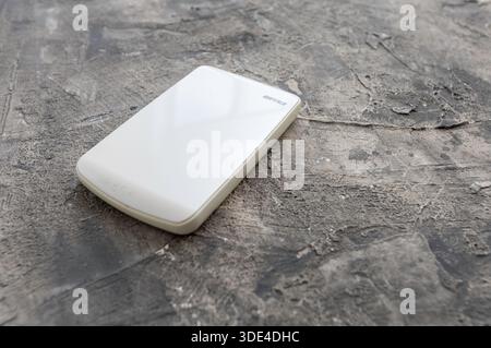 A Buffalo brand made in Japan USB external hard disc unusually coloured white making it easier to identify amongst its more common black bretheren. Stock Photo