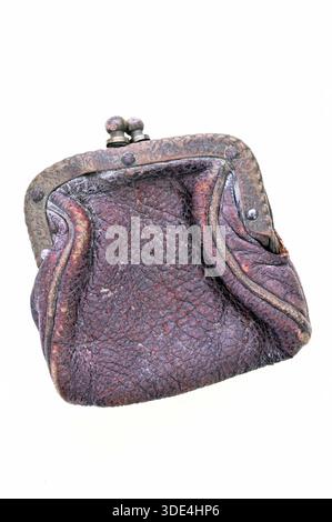Small worn vintage brown leather purse with brass metal clasp Stock Photo