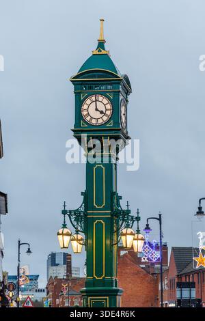 The Chamberlain Clock, located at the junction of Warstone Lane, Vyse Street, and Frederick Street in Birmingham’s Jewellery Quarter, is a prominent Edwardian cast-iron clock tower erected in 1903 to commemorate Joseph Chamberlain’s visit to South Africa following the Second Boer War. Stock Photo