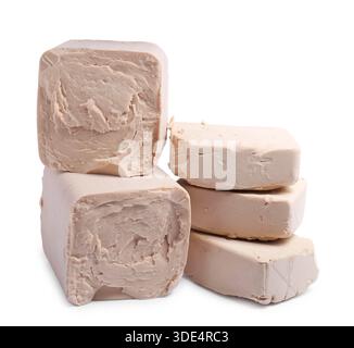 Blocks of compressed yeast on white background Stock Photo
