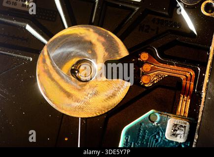 A damaged hard drive from an Apple computer. Stock Photo