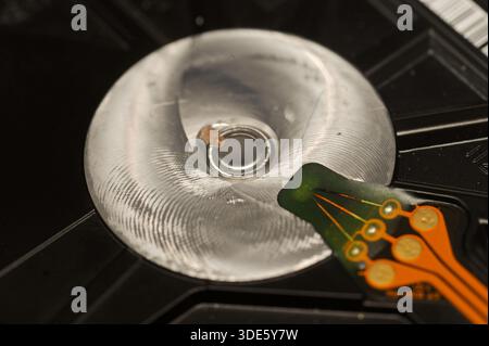 A damaged hard drive from an Apple computer. Stock Photo