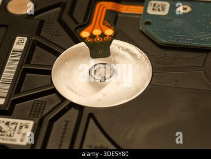 A damaged hard drive from an Apple computer. Stock Photo