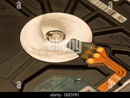 A damaged hard drive from an Apple computer. Stock Photo