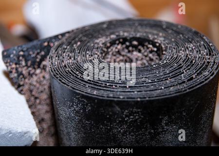 Rolled bitumen waterproofing membrane on construction site close view Stock Photo