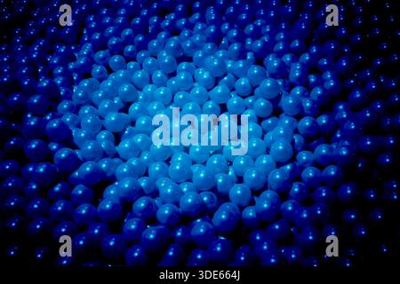 Abstract blue spheres in a lattice pattern with smooth gradient lighting creating a calm digital flow and modern Stock Photo