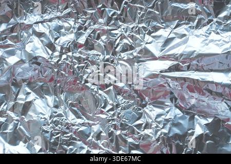 Aluminum foil texture background. Crumpled aluminum foil background. Stock Photo