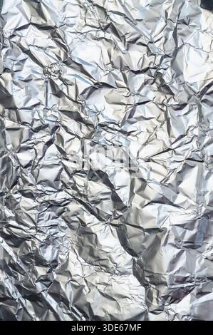 Aluminum foil texture background. Crumpled aluminum foil background. Stock Photo